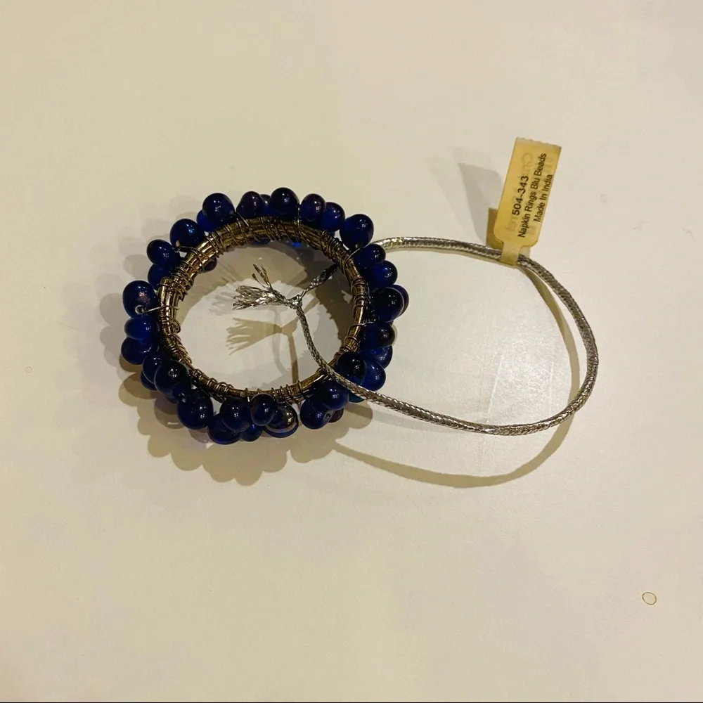 NWT Crate & Barrel 4 Napkin Rings.Blu Iridescent Beads.Great for casual or party